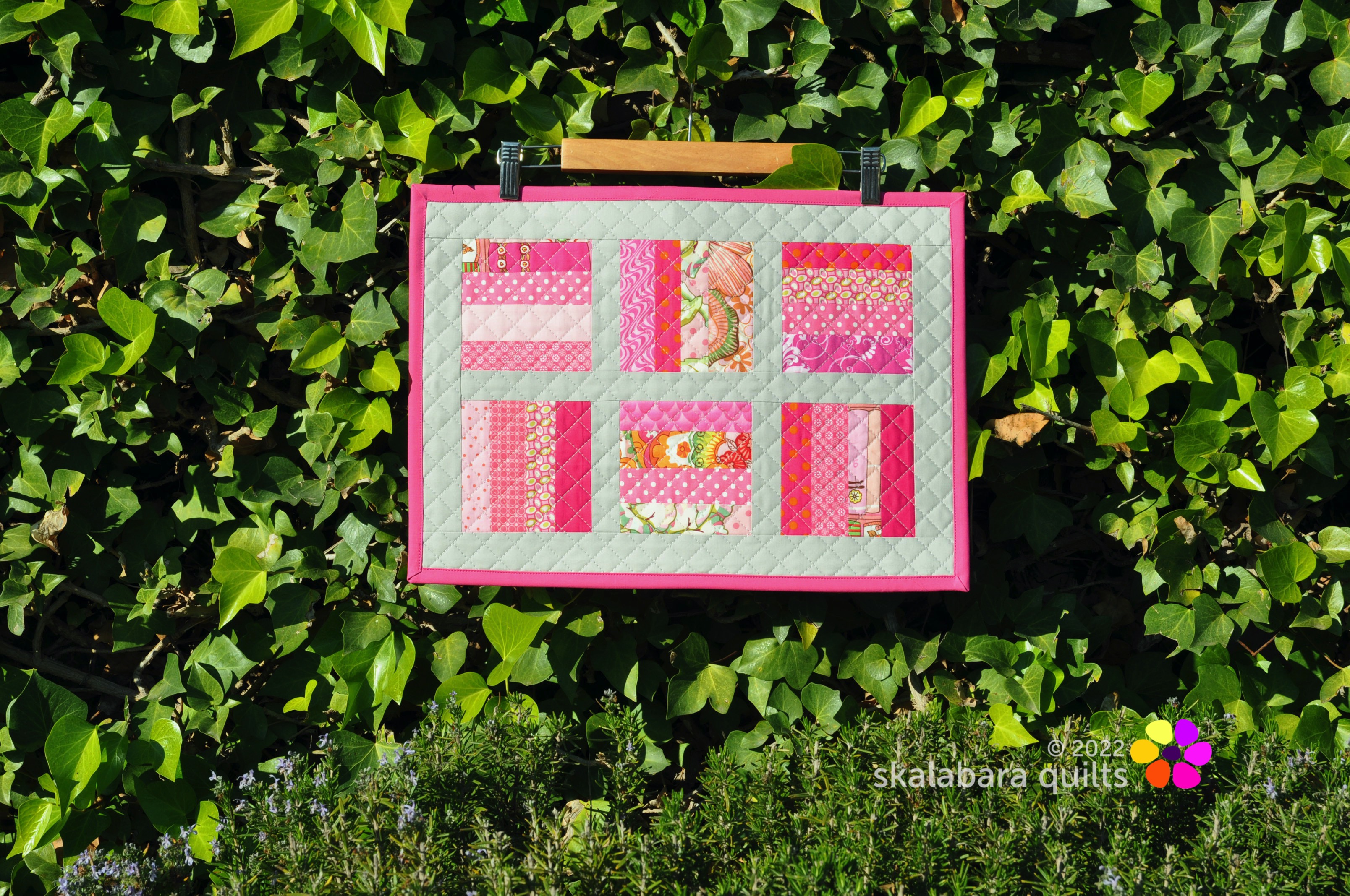 set of quilted placemats in pink - skalabara quilts